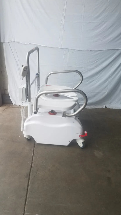 White liftseat LS600 bariatric power toilet lift with silver metal frame red accents and wheeled toilet seat for transport