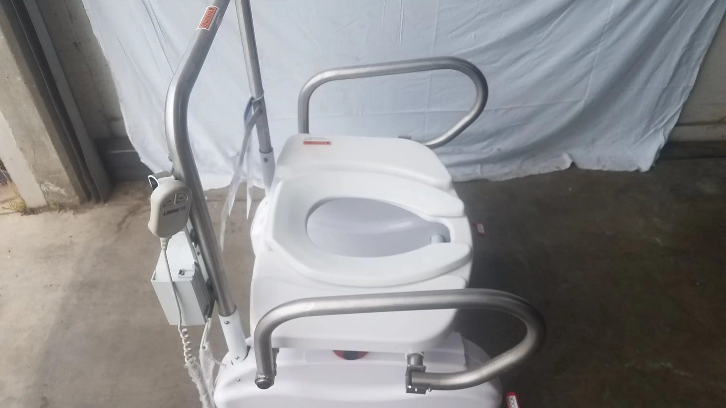 White LiftSeat LS600 bariatric power toilet lift with silver metal frame and handlebars for enhanced mobility