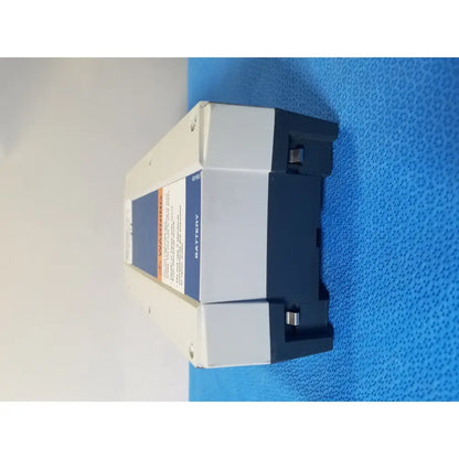 Gray and black linak baj100000011 24v rechargeable battery with blue warning label for patient lift hoist
