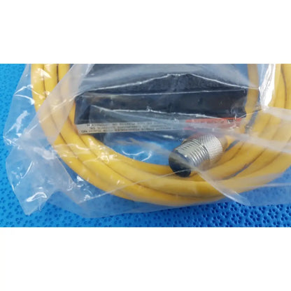 Yellow coiled cable with metallic threaded connector and black housing for linemaster treadlite t-91-s foot switch packaged in clear plastic