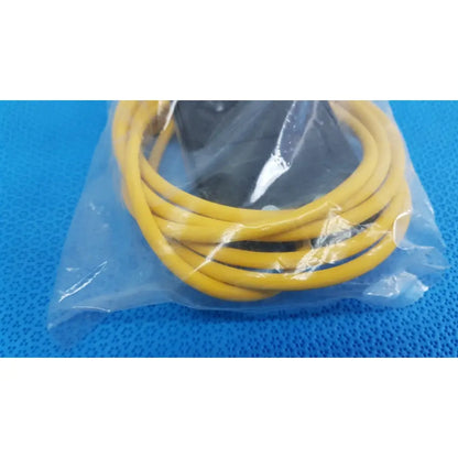 Yellow coiled cable in clear plastic bag for linemaster treadlite t-91-s foot switch electric control pedal