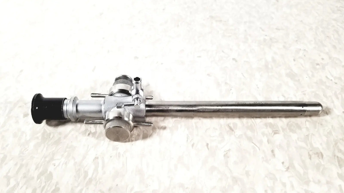 Silver linvatec 118100 l 354530 laparoscopy cannula with black eyepiece and multiple adjustment knobs for laparoscopic instruments