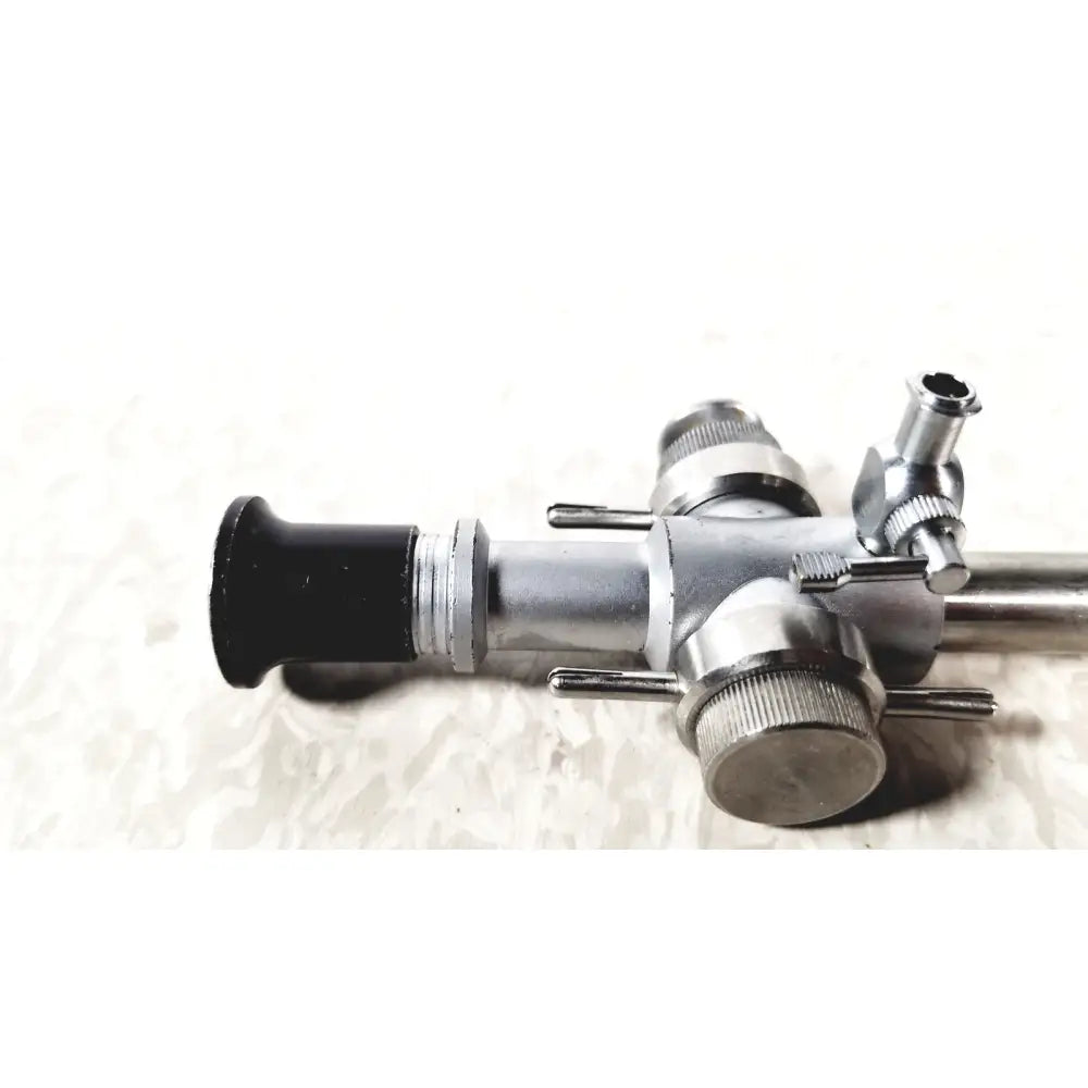 Linvatec 118100 L. 354530 silver laparoscopy cannula with black ergonomic handle and adjustable knobs for reuse medical use