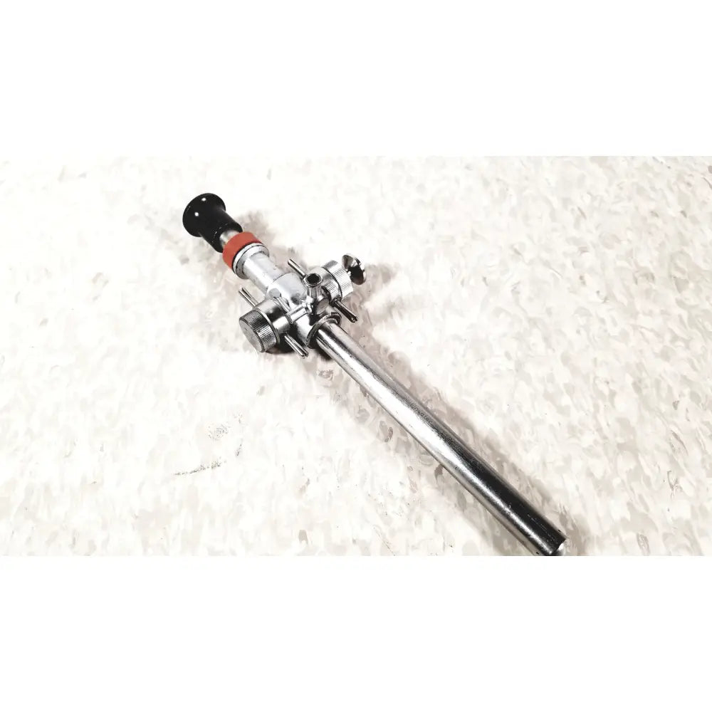 Silver surgical retractor with black and red accents for linvatec conmed hasson laparoscopic valve use