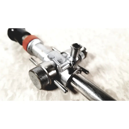 Silver metallic linvatec conmed 118100 hasson laparoscopic valve gas regulator with black and orange accents