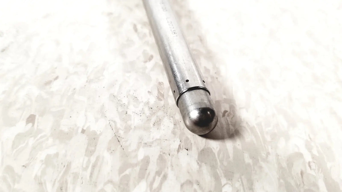 Silver metallic camshaft with polished spherical tip and evenly spaced holes for linvatec conmed hasson laparoscopic valve