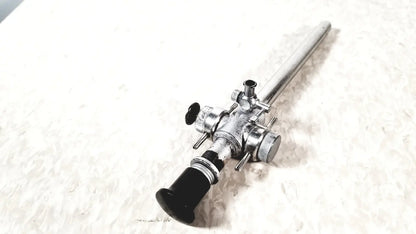 Linvatec Conmed laparoscopic valve with silver-colored endoscope and black handle featuring adjustment knobs