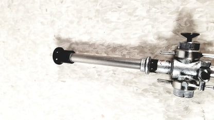 Silver metallic linvatec conmed 118100 laparoscopic valve with black caps and threaded fittings for laparoscopic instruments