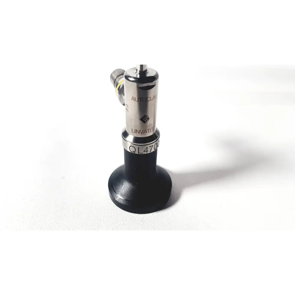 Silver and black linvatec ql4700 quicklatch 70° 4mm arthroscope arthroscopy device with engraved branding