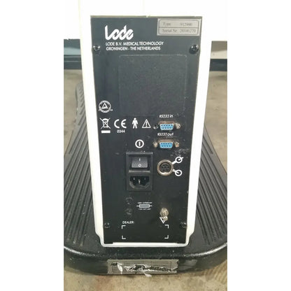Black and white lode corival 912900 ergometer stress test device back with rs232 ports power switch and serial number label