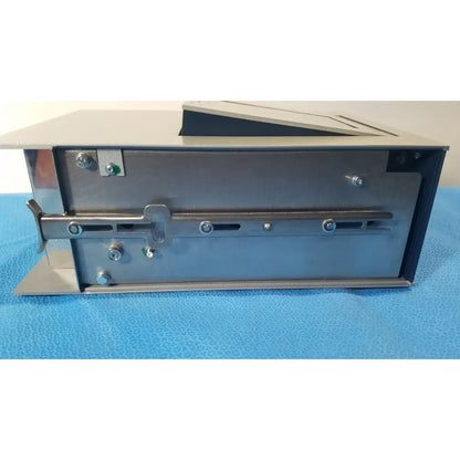Silver metallic industrial box with hinged lid and latch mechanism in lonza 4d-nucleofector core unit transfection system