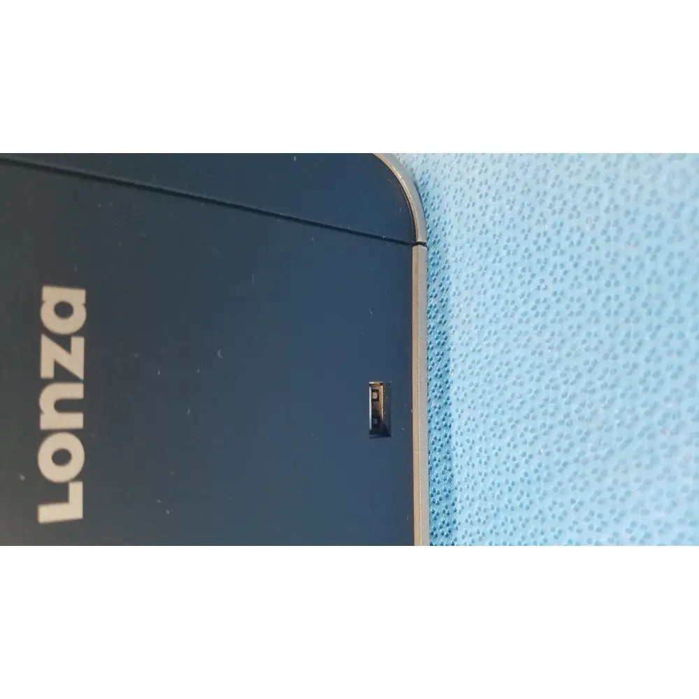 Black lonza 4d-nucleofector core unit transfection device with silver edge and small rectangular port for unit transfection