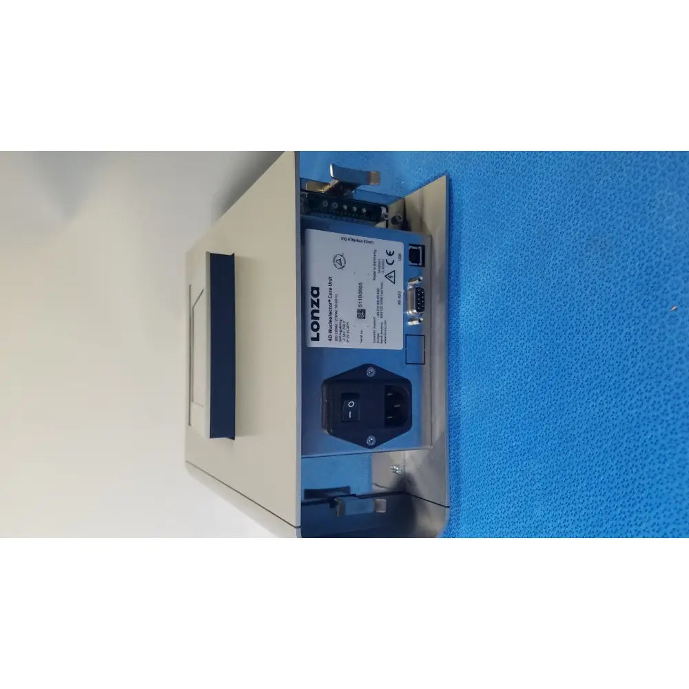 Beige and blue lonza core unit transfection thermal printer with black power switch ethernet port and serial connector backside