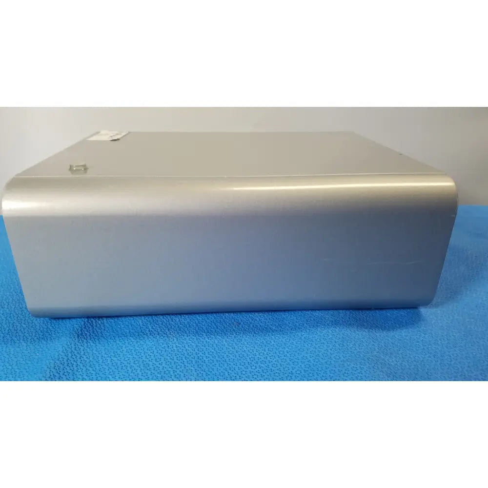 Silver metallic rectangular lonza 4d-nucleofector x unit with rounded edges and smooth reflective surface for reuse medical use
