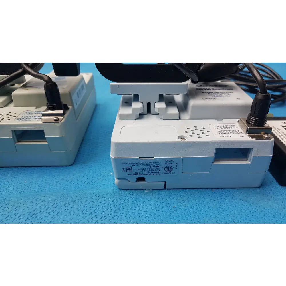 Lot of 2 Baxter Sigma Spectrum Infusion Pumps With AC Power Adapters P/N 35162 - Volumetric Large Volume Infusion Pump
