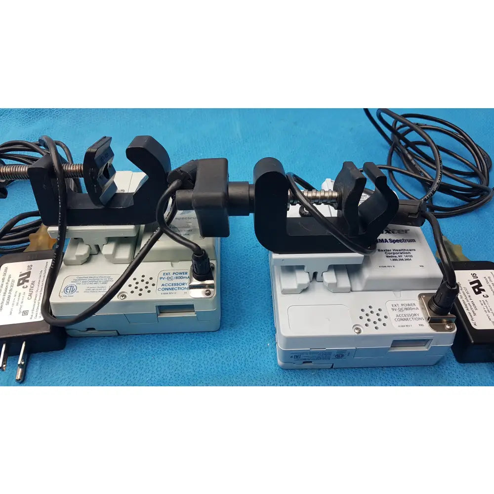 Lot of 2 Baxter Sigma Spectrum Infusion Pumps With AC Power Adapters P/N 35162 - Volumetric Large Volume Infusion Pump