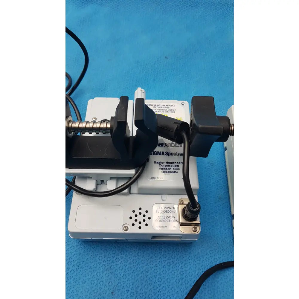 Lot of 2 Baxter Sigma Spectrum Infusion Pumps With AC Power Adapters P/N 35162 - Volumetric Large Volume Infusion Pump