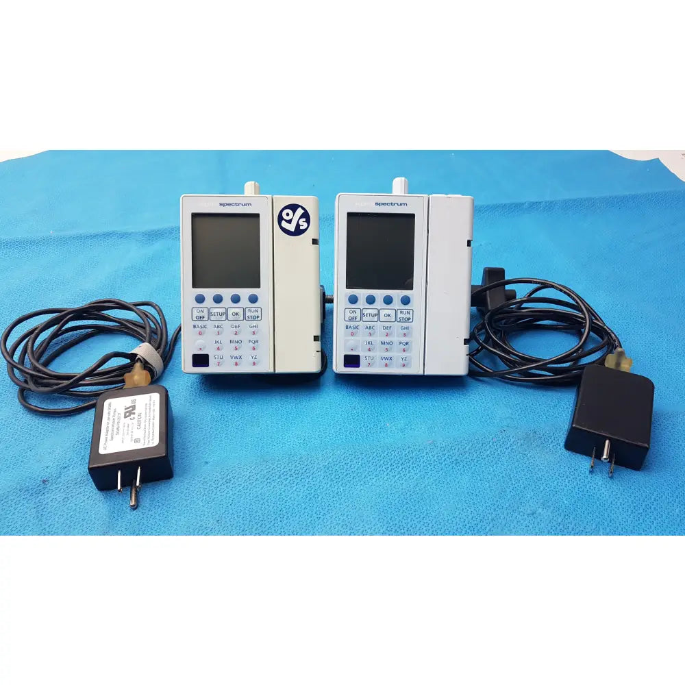 Lot of 2 Baxter Sigma Spectrum Infusion Pumps With AC Power Adapters P/N 35162 - Volumetric Large Volume Infusion Pump