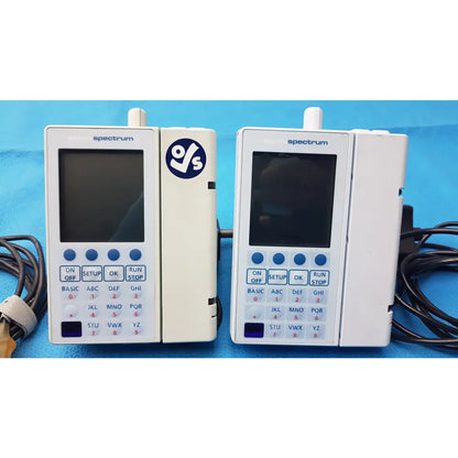 Lot of 2 Baxter Sigma Spectrum Infusion Pumps With AC Power Adapters P/N 35162 - Volumetric Large Volume Infusion Pump