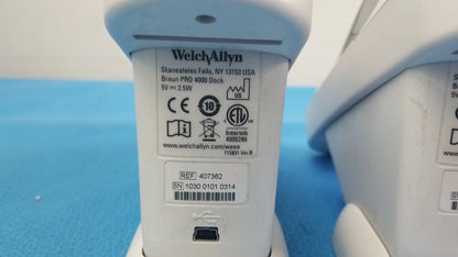 White plastic braun pro 4000 dock charging station with usb port and regulatory labels for reuse medical equipment
