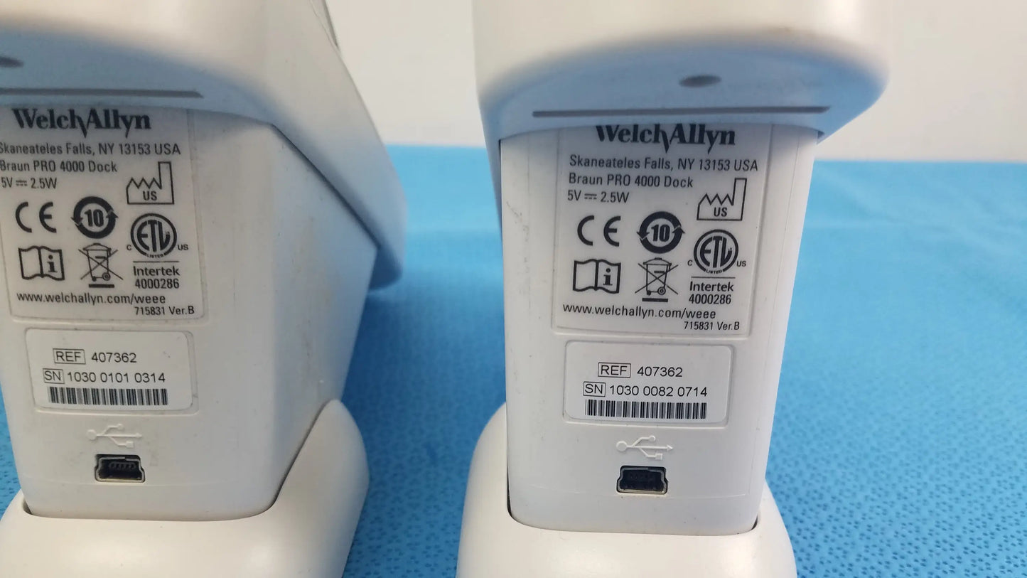 White plastic braun pro 4000 thermo scan charging dock with matte finish and label for reuse medical equipment lot of 2