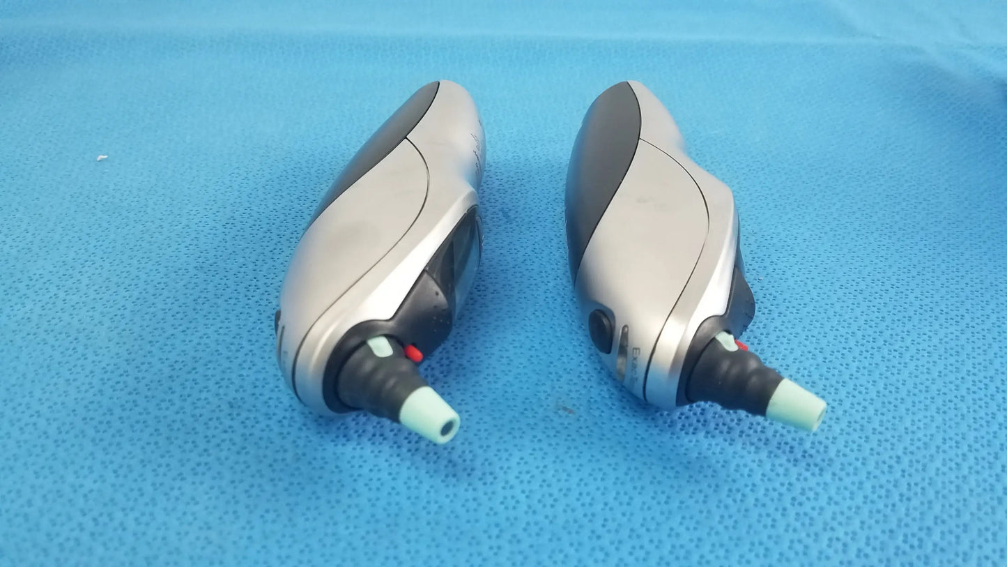 Lot of 2 braun pro 4000 handheld ear irrigation devices silver black with light green tips and welch allyn charging dock medical equipment for reuse medical use