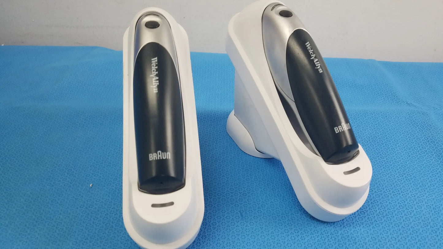 Two white and black braun series 3 electric shavers in charging stands included in lot of 2 braun pro 4000 reuse medical equipment