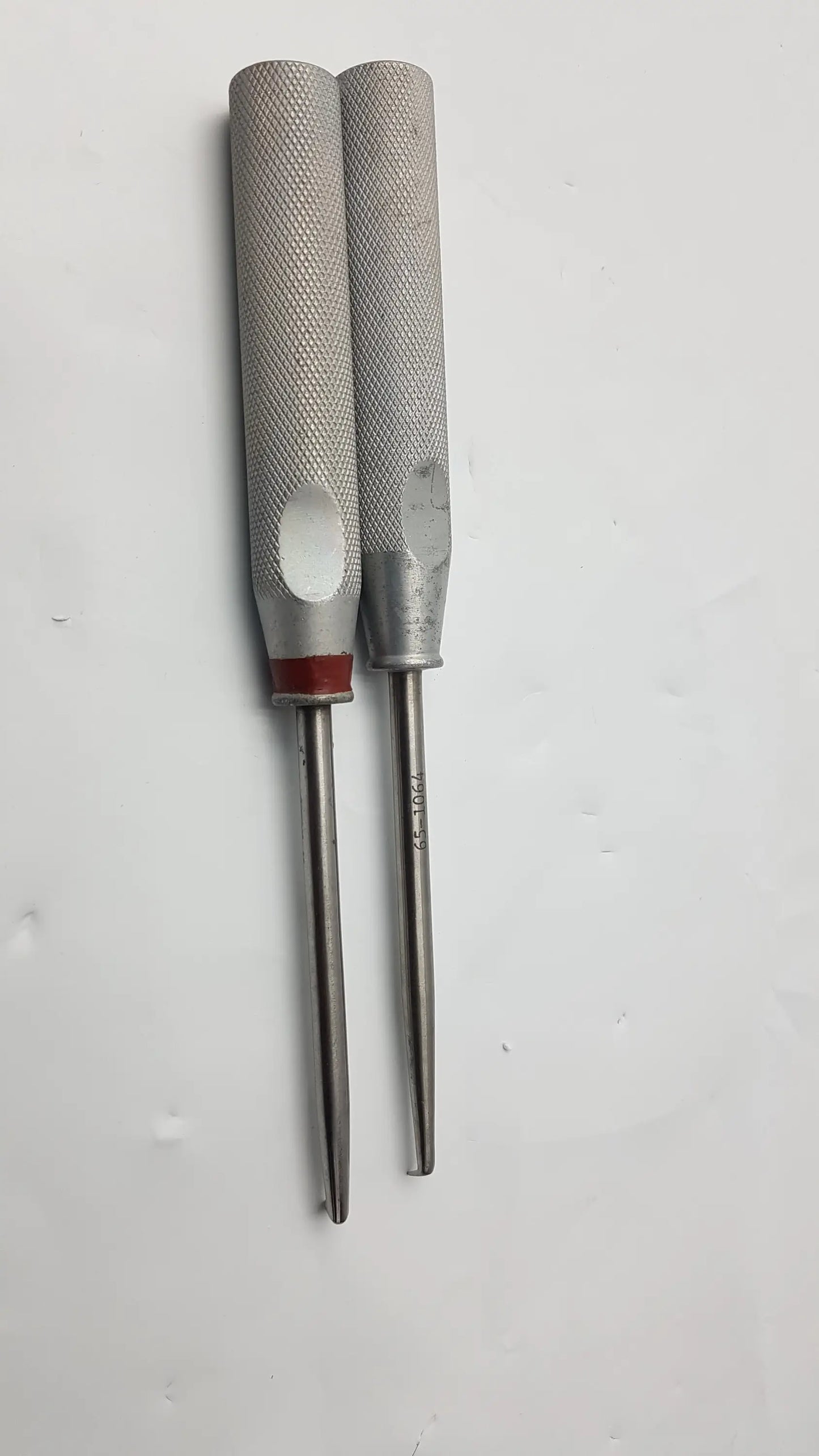 Lot of 2 codman 8710n osteophyte elevators orthopedic surgical tools with textured silver handles and red bands
