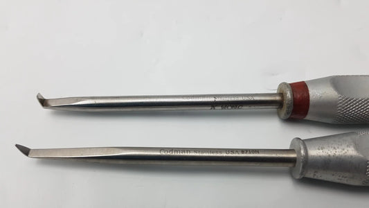 Two stainless steel codman 8710n osteophyte elevators with textured silver handles and red accents for orthopedic surgical use