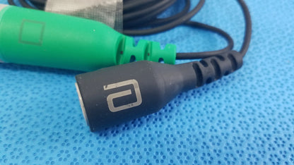 Black audio catheter connector cable with silver logo and textured grip for reuse medical equipment applications