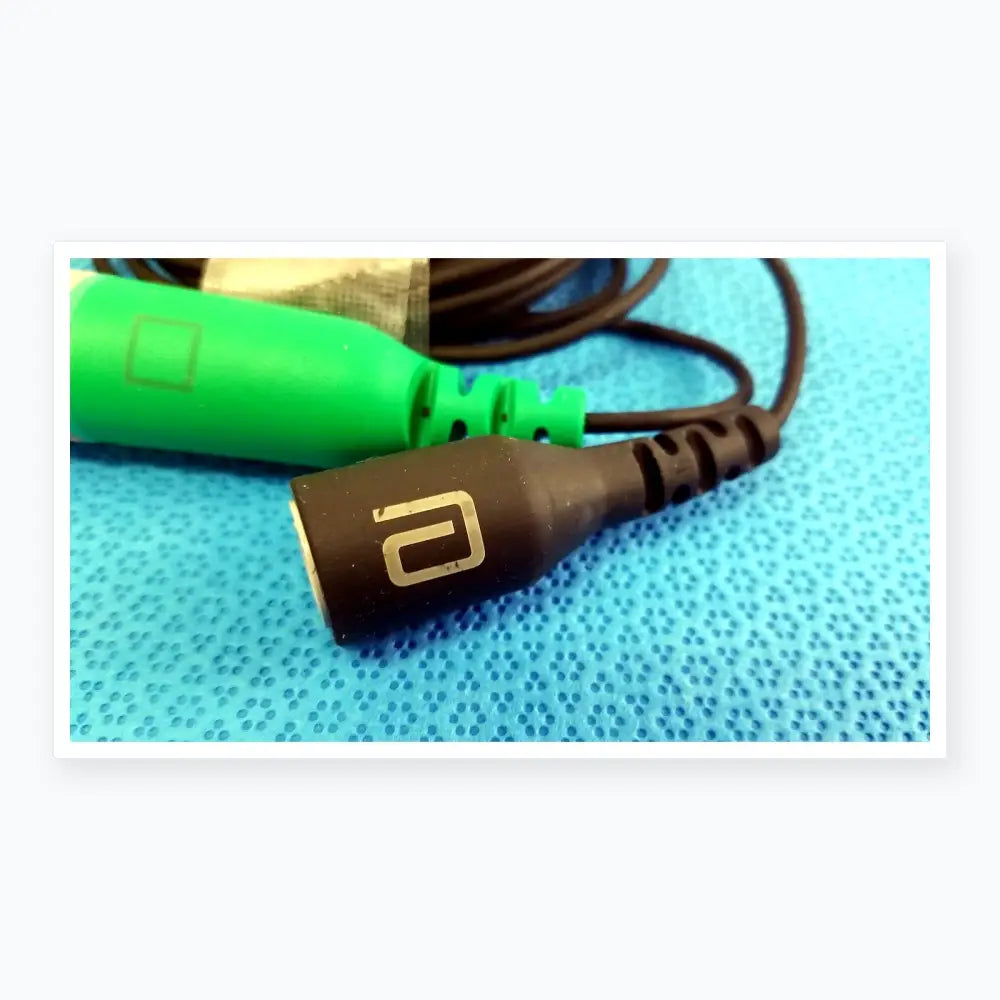 Black audio catheter connector cable with silver logo and textured grip for reuse medical equipment applications