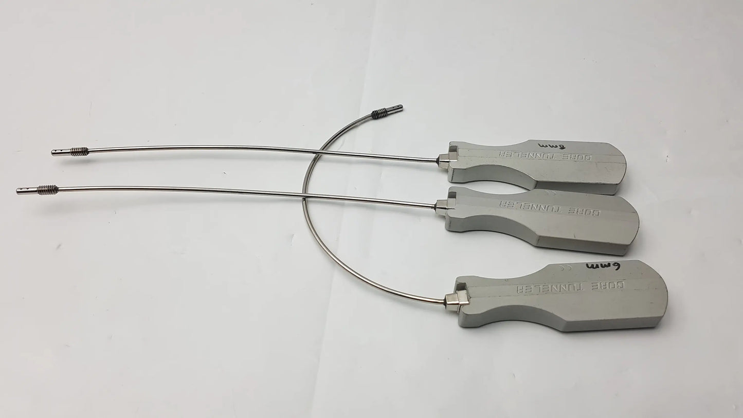 Three gray titanium gore tunneler surgical forceps with slight curve long and full curve long engraved markings