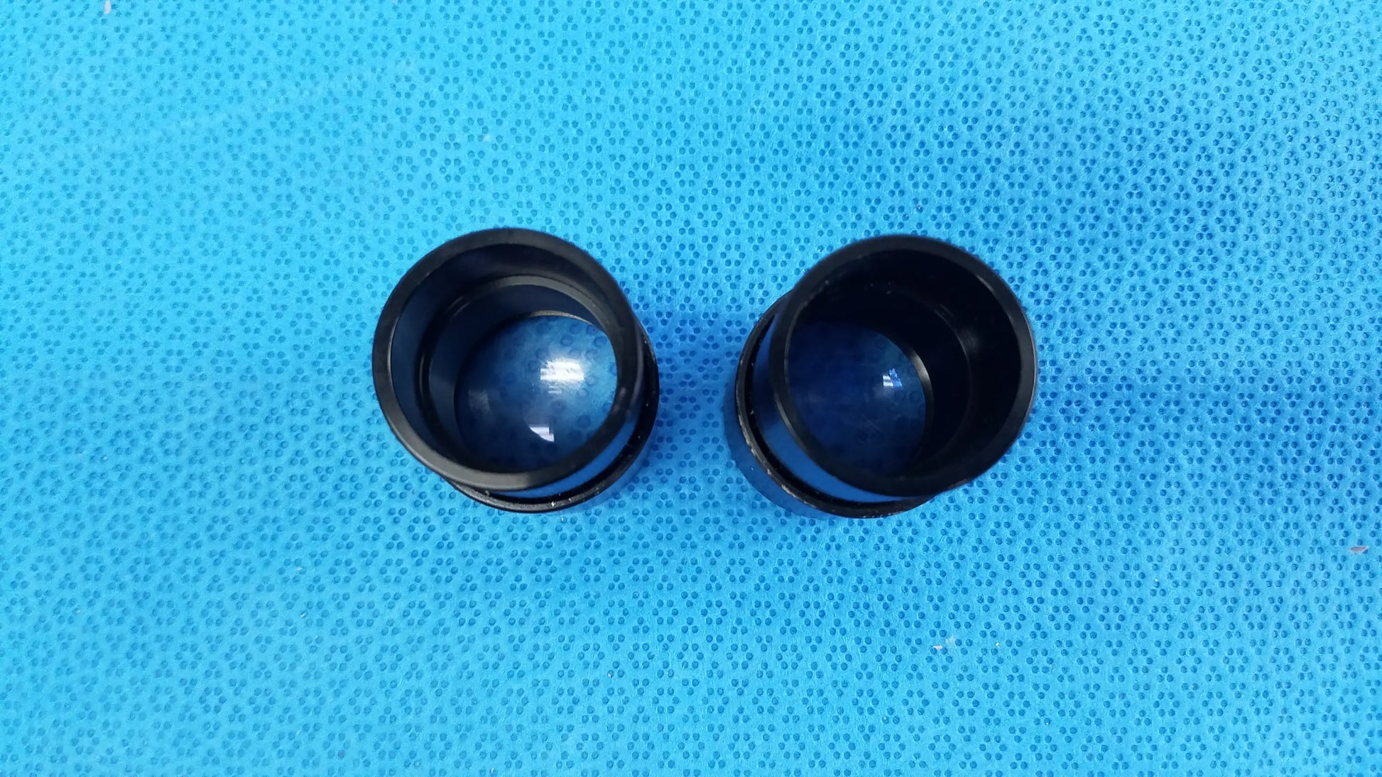 Black cylindrical lens caps with glossy finish and reflective inner surfaces for swh10x precision optical microscope eyepieces