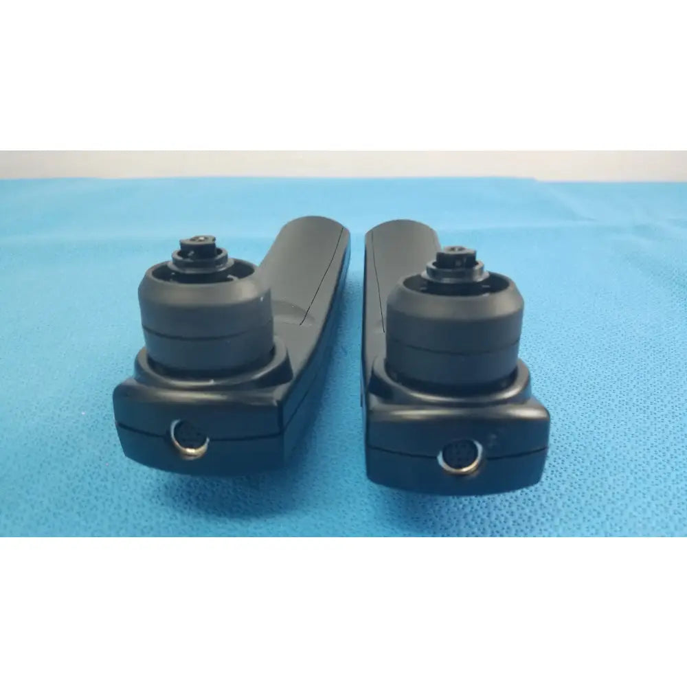 Lot of 2 Maico Ero Scan Pro handheld auditory scanners with black plastic surgical retractors and rounded handles for hearing screening medical equipment