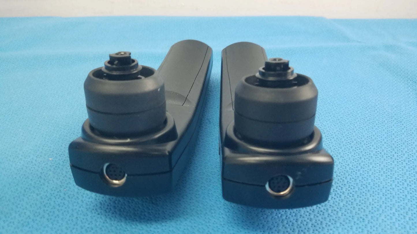 Lot of 2 Maico Ero Scan Pro handheld auditory scanners with black plastic surgical retractors and rounded handles for hearing screening medical equipment