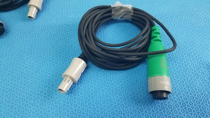 Lot of 2 stryker catheter connector cables black coiled with white and green-gray industrial plugs for medical equipment reuse