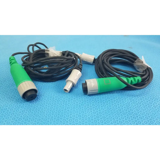 Lot of 2 stryker catheter connector cables with green and gray connectors and black coiled cords for medical equipment reuse
