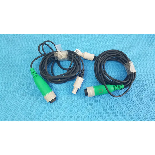 Lot of 2 Stryker catheter connector cables with black coiled cables and green and gray connectors for medical equipment reuse