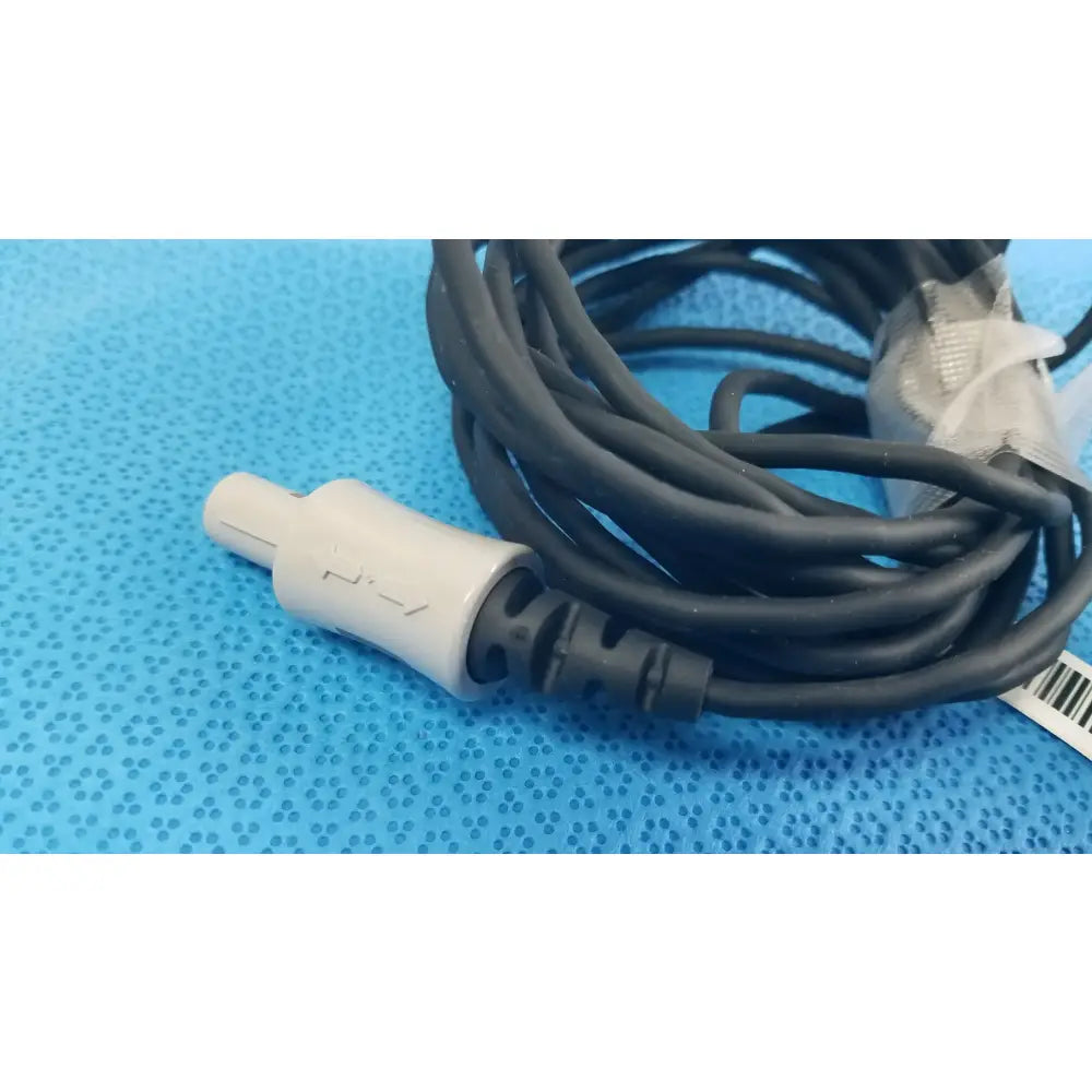 Lot of 2 Stryker catheter connector cables black coiled with light gray embossed medical equipment connectors for reuse