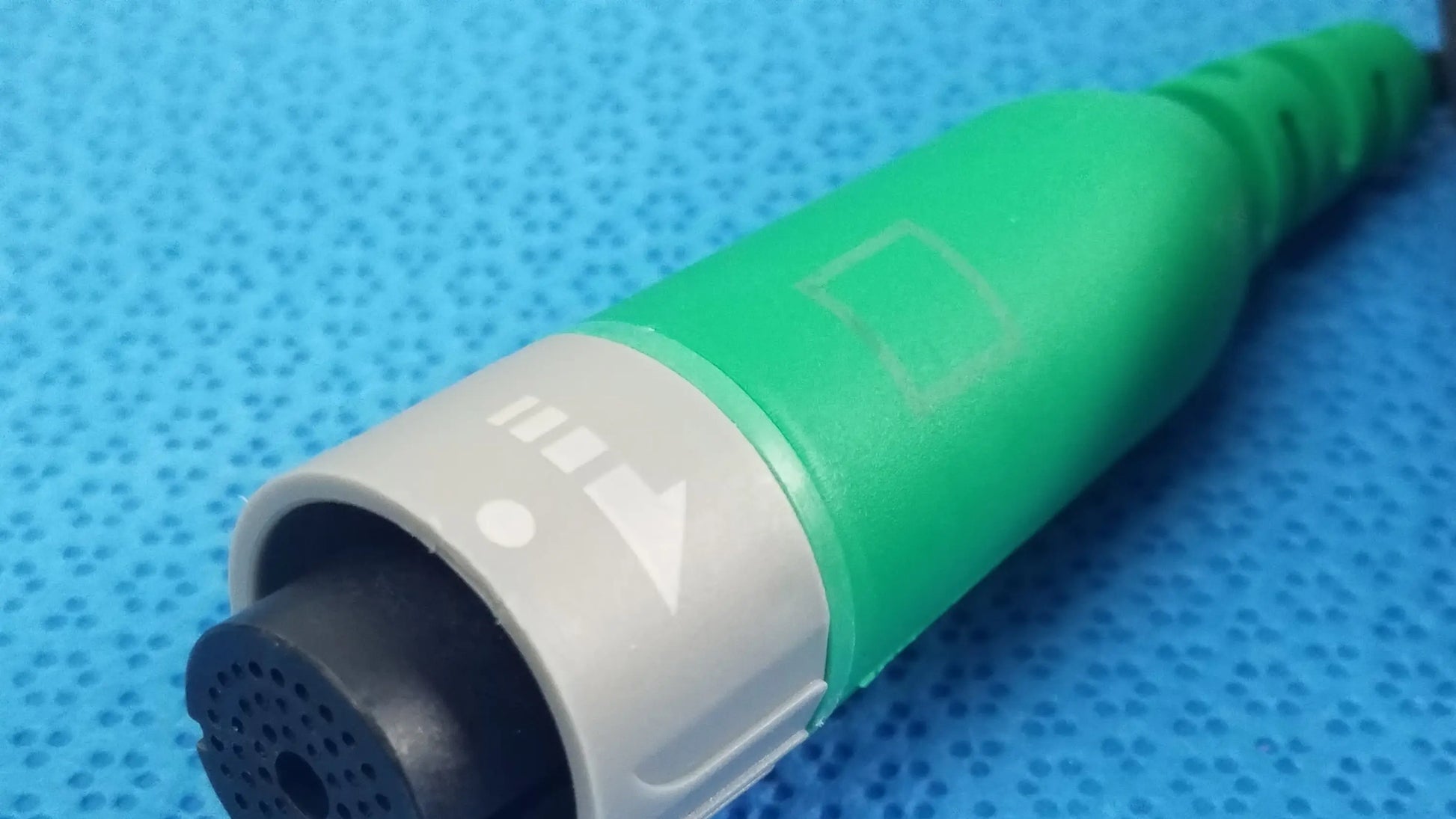 Green and gray D-ENS-L/R-HOD-CBL Ensite X EP system connector cable with black perforated end cap for medical equipment reuse