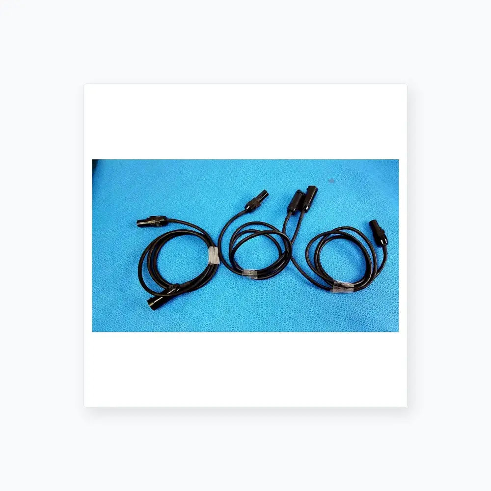 Lot of 3 black mc4 solar connector extension cables with metallic connectors secured by clear plastic ties for photovoltaic use