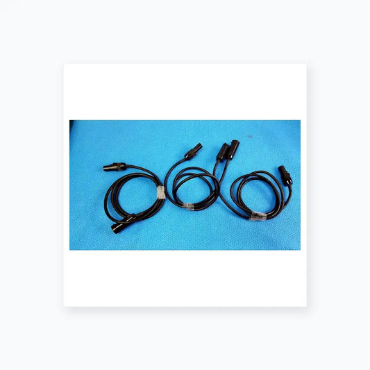 Lot of 3 black mc4 solar connector extension cables with metallic connectors secured by clear plastic ties for photovoltaic use