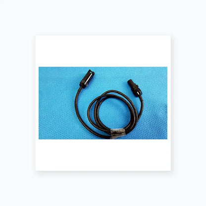 Black coiled mc4 solar connector extension cable with two black plastic connectors including threaded collar for reuse medical equipment