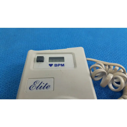 White plastic natus neurology elite 200r handheld doppler with digital heart rate monitor and coiled beige cable for medical equipment reuse
