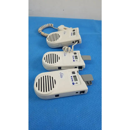 Lot of 3 white plastic natus neurology elite 200r handheld dopplers with coiled cords and digital displays medical equipment