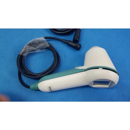White and teal verathon bladderscan handheld ultrasound probe with coiled black cable for reuse medical equipment
