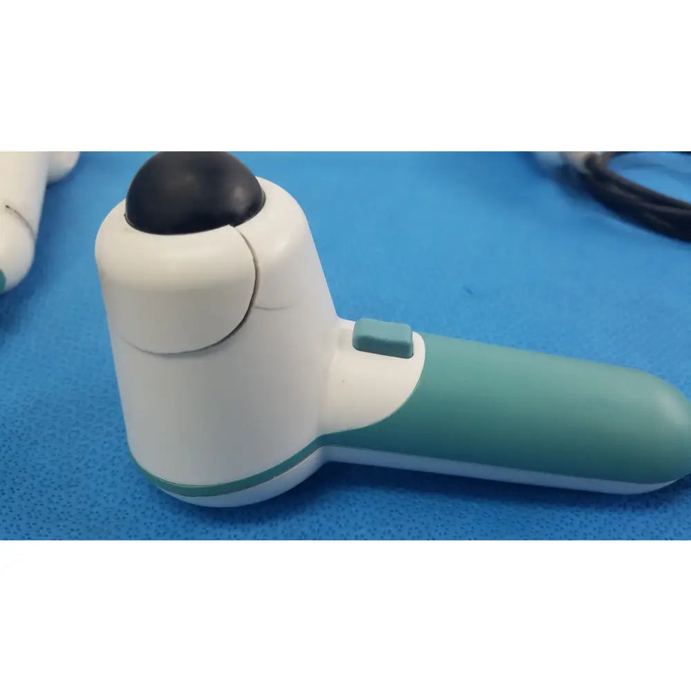 White and teal handheld verathon bladderScan ultrasound probe with black spherical tip for reuse medical equipment