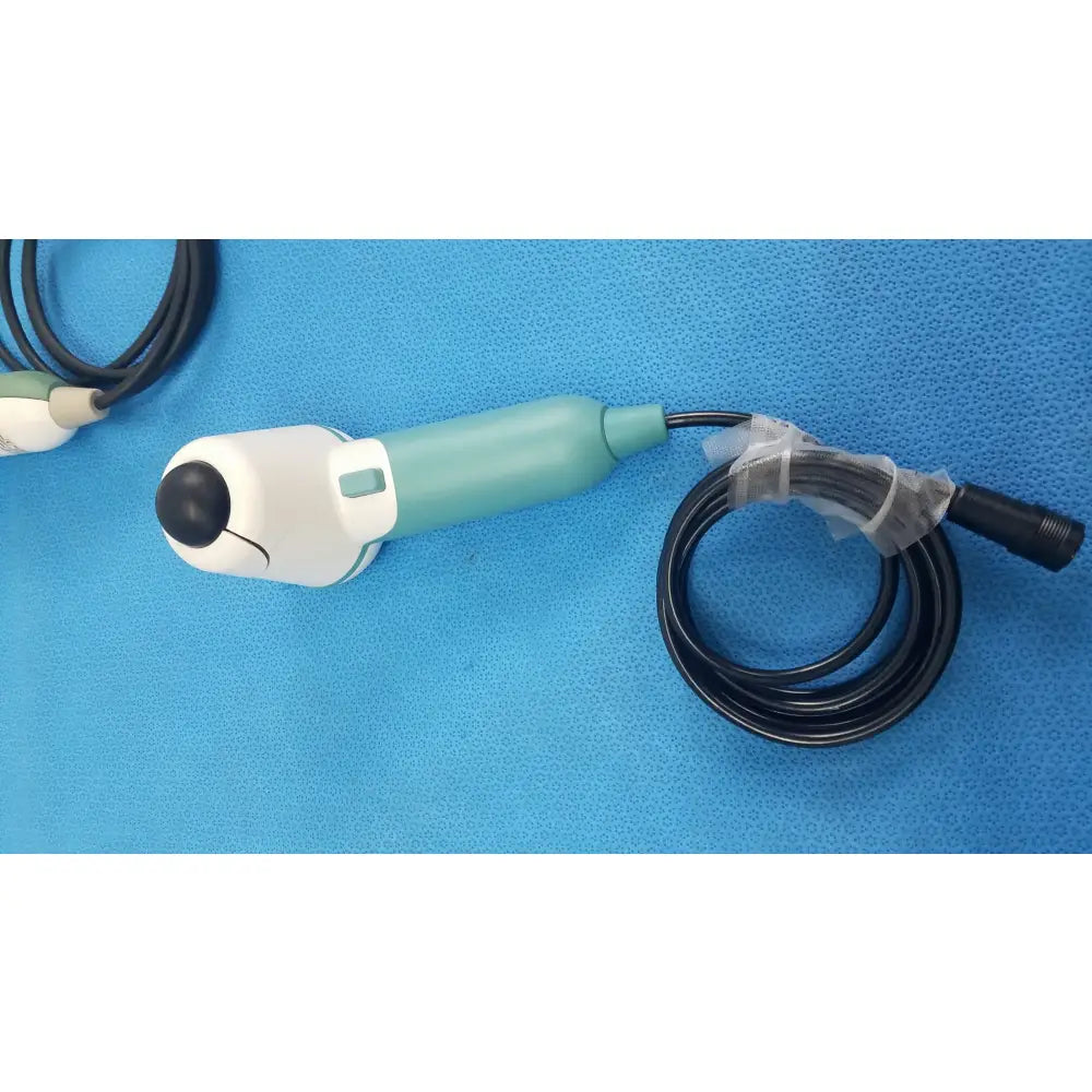 Teal and white verathon bladderscan ultrasound probe with black cable medical equipment for reuse medical equipment