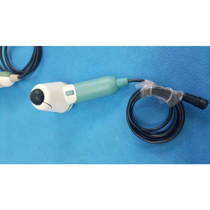 Teal and white verathon bladderscan ultrasound probe with black cable medical equipment for reuse medical equipment
