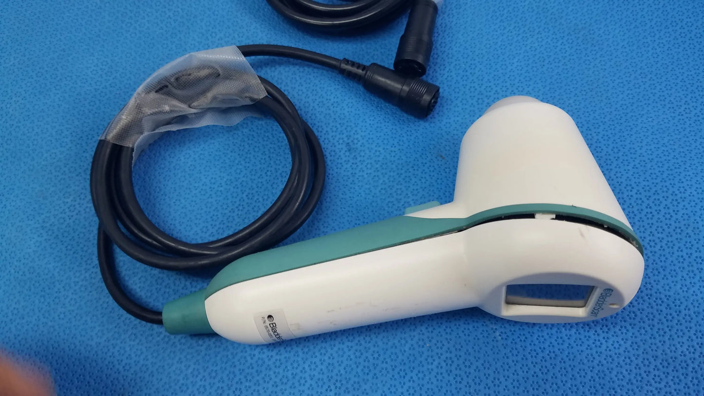 White and teal verathon bladderscan handheld ultrasound probe with coiled black cable for reuse medical equipment